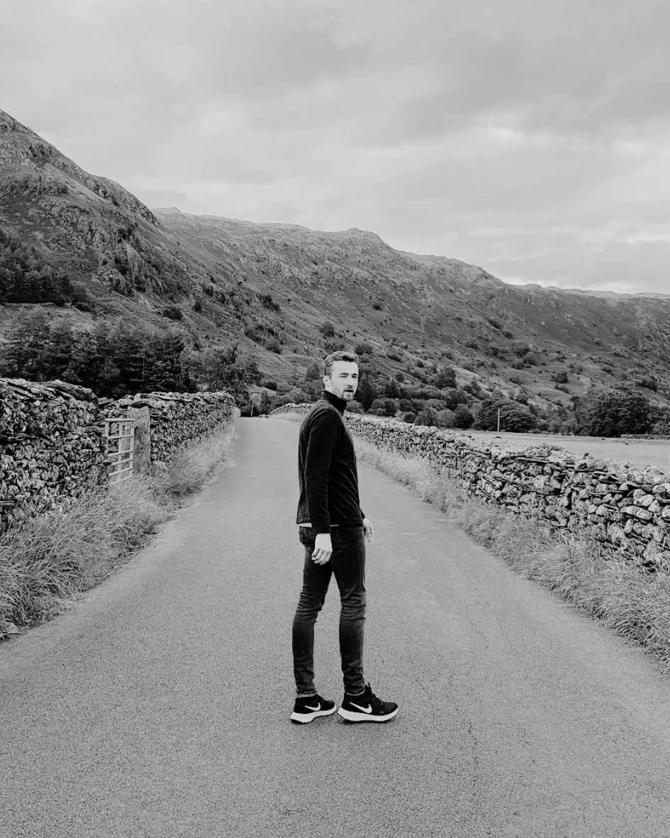 Ash, founder of Society of Poets, standing in the Langdales, Lake District